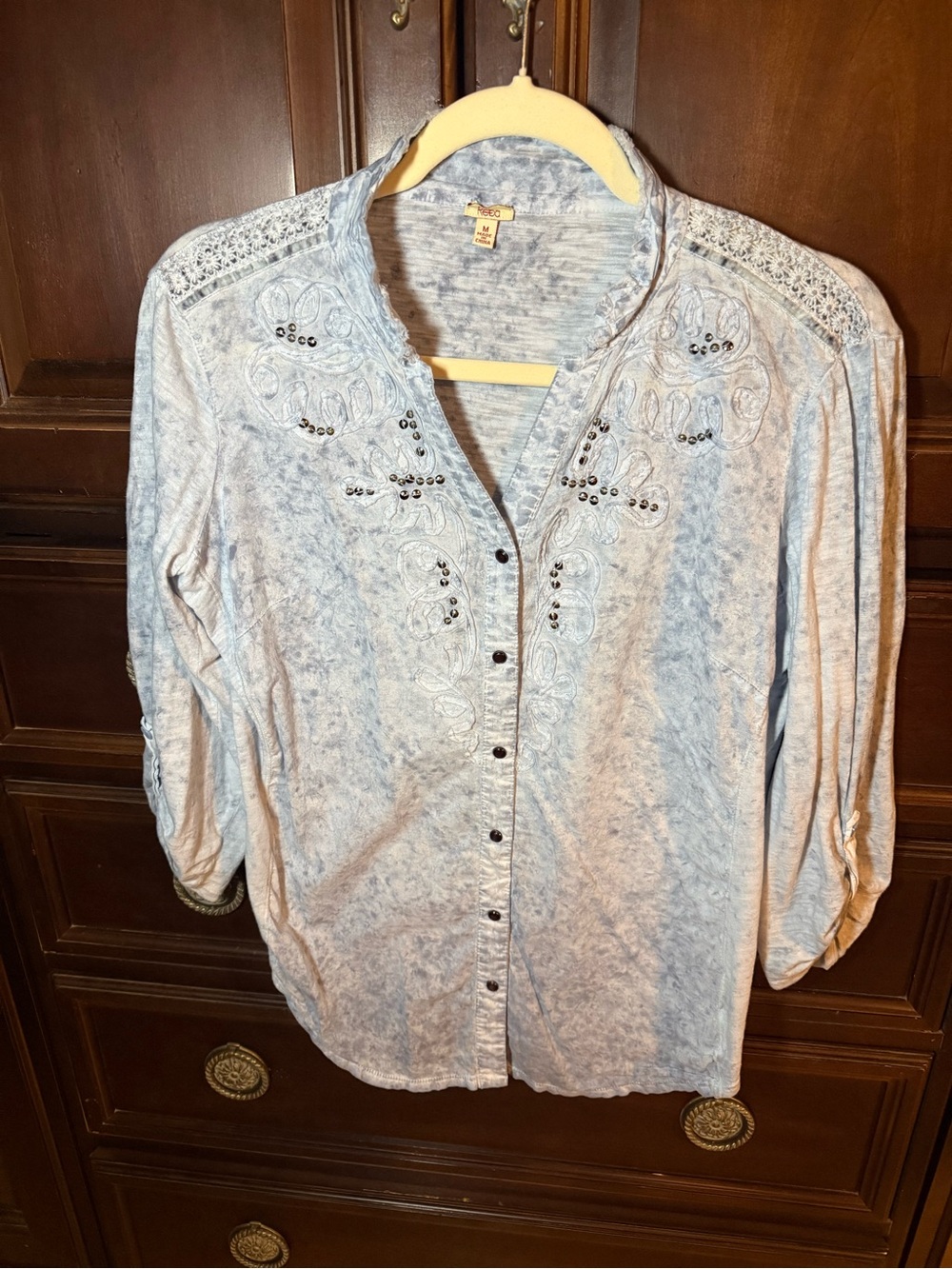 Reba medium women’s light blue top